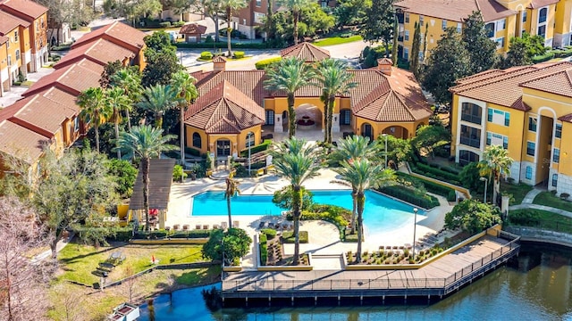 birds eye view of property featuring a water view