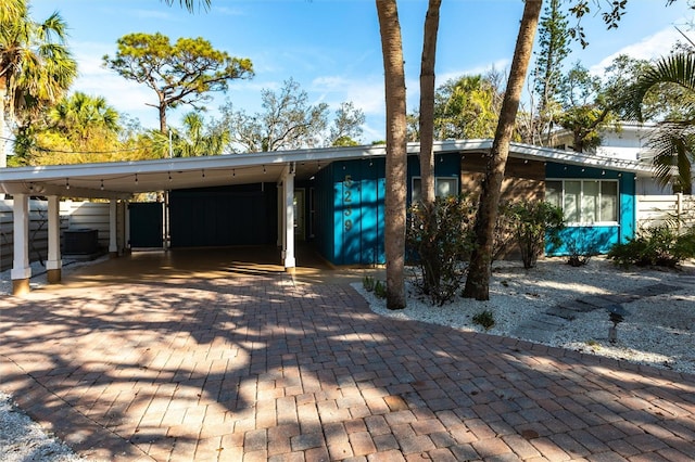 view of front of house with a carport