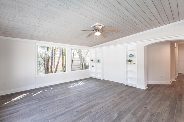 empty room featuring lofted ceiling, ornamental molding, dark wood-type flooring, and wooden ceiling