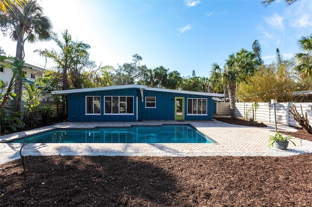 view of swimming pool featuring a patio area