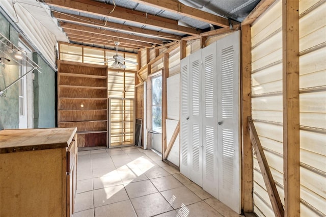 storage room featuring ceiling fan