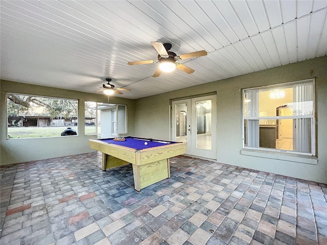 rec room featuring billiards and french doors