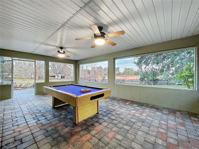 rec room with pool table and a wealth of natural light