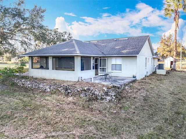 rear view of property with a patio area