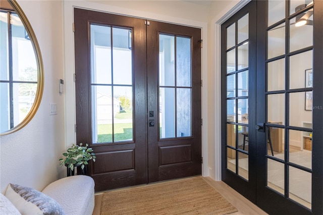 entryway featuring french doors