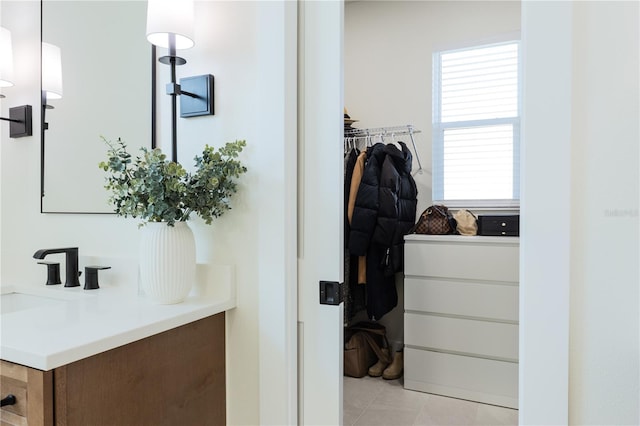 bathroom with sink and tile patterned floors