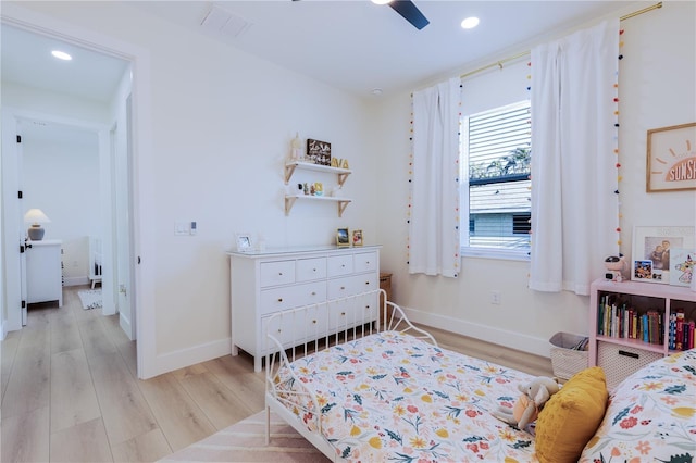 bedroom featuring ceiling fan and light hardwood / wood-style floors