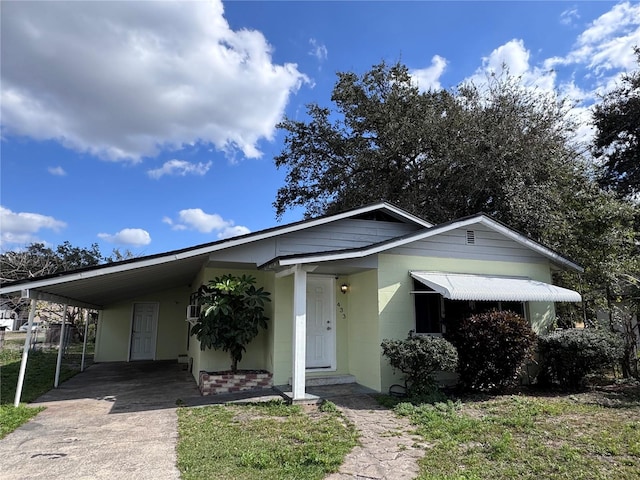 view of front of house featuring a carport