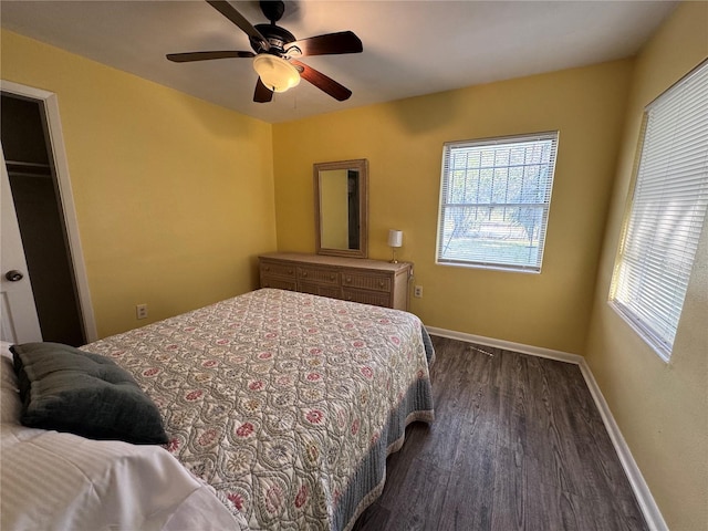 bedroom featuring dark wood-type flooring and ceiling fan