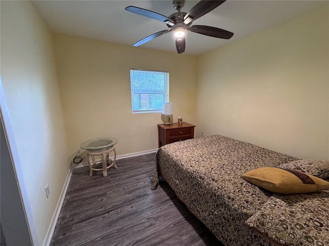 bedroom featuring dark hardwood / wood-style floors and ceiling fan