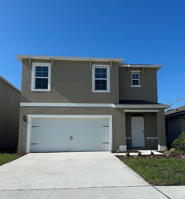 view of front of house with a garage