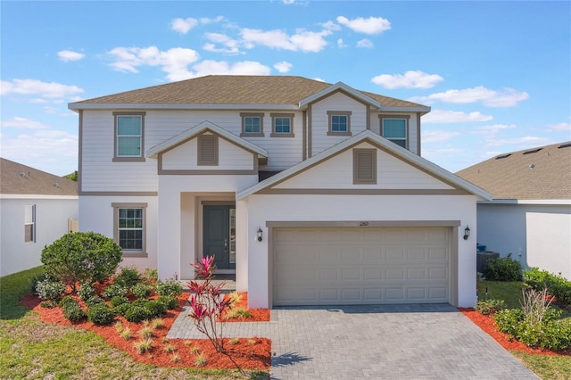 view of property with a garage