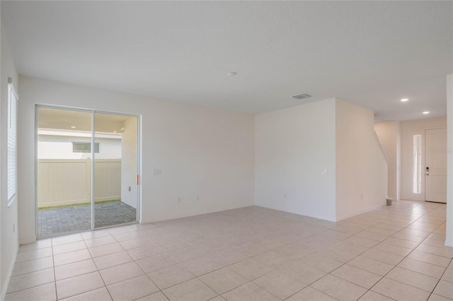 empty room featuring light tile patterned flooring