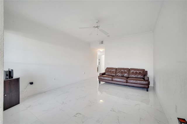 living room featuring crown molding and ceiling fan