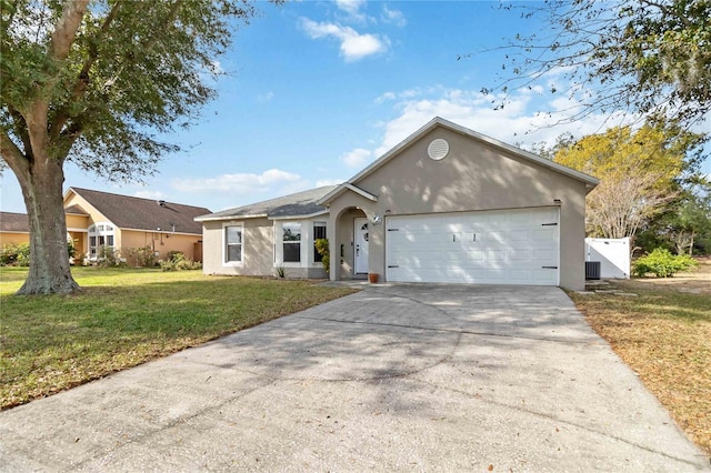 single story home featuring cooling unit, a garage, and a front lawn