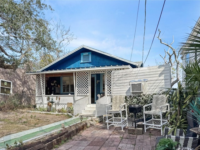 rear view of house featuring a patio area