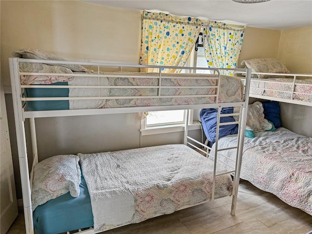 bedroom with wood-type flooring