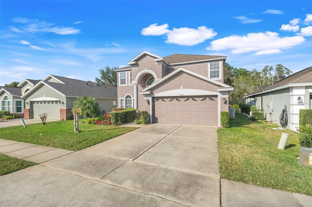 front of property featuring a garage, a front yard, and central air condition unit