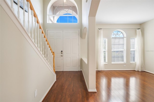 foyer entrance featuring dark hardwood / wood-style flooring