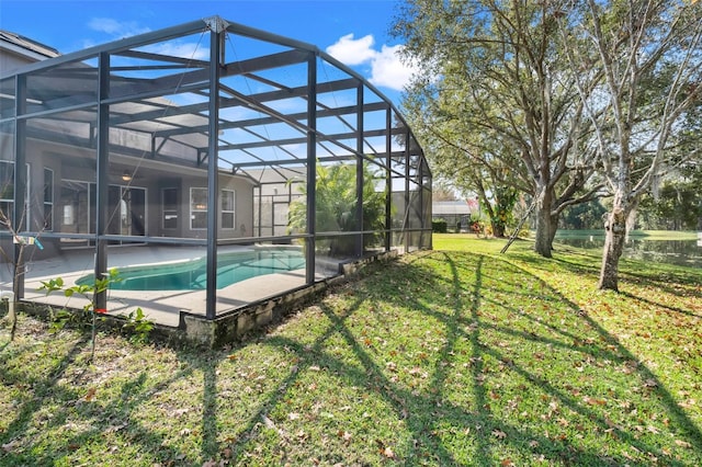 exterior space with a yard, a lanai, and a patio area