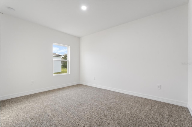 view of carpeted spare room