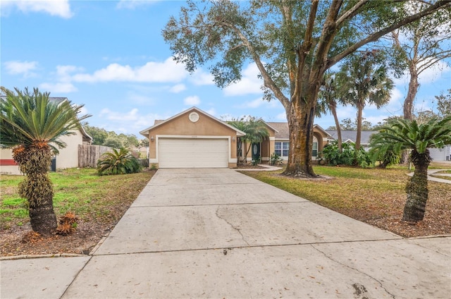 ranch-style house with a garage and a front lawn