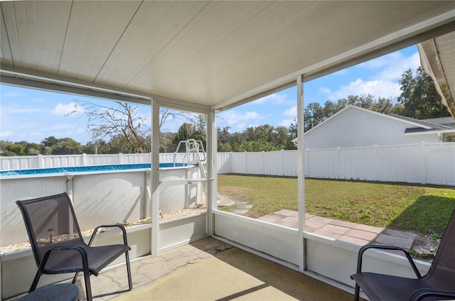 sunroom with wooden ceiling