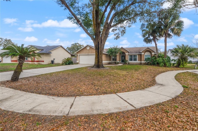 single story home with a garage