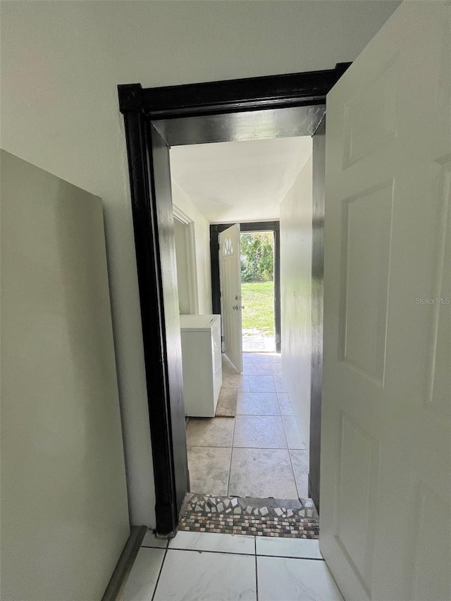 hallway featuring washer / dryer