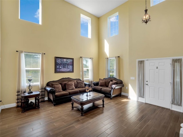 living room featuring a healthy amount of sunlight and hardwood / wood-style floors