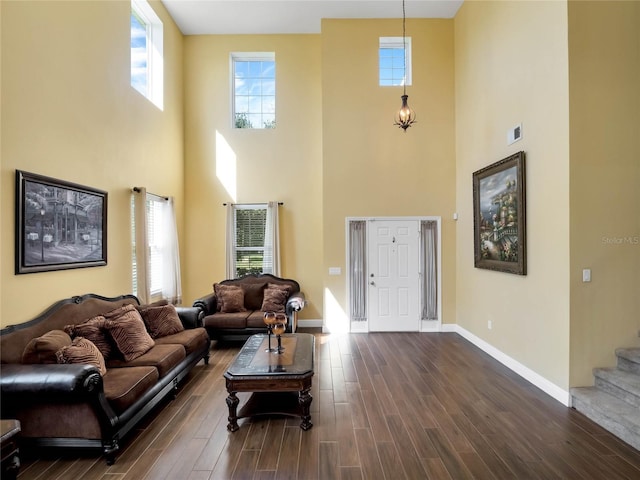 living room with dark hardwood / wood-style floors