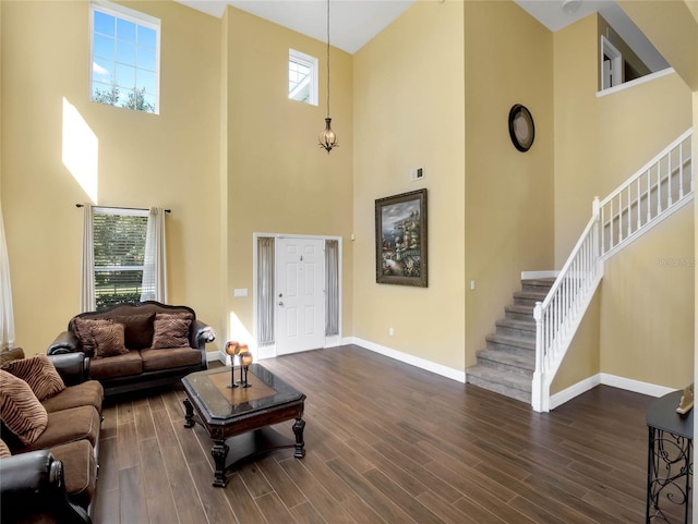 living room with dark hardwood / wood-style floors