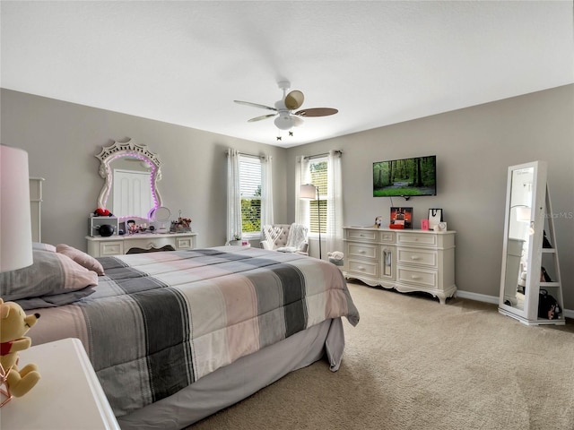 carpeted bedroom featuring ceiling fan