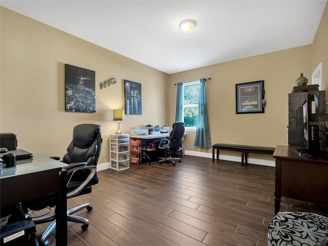 office space with dark hardwood / wood-style flooring