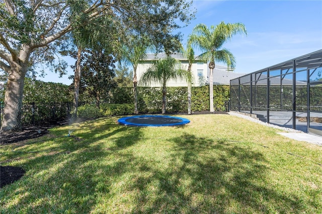 view of yard featuring a trampoline