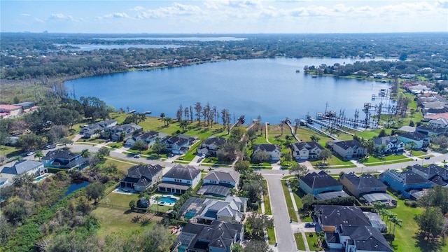 birds eye view of property with a water view