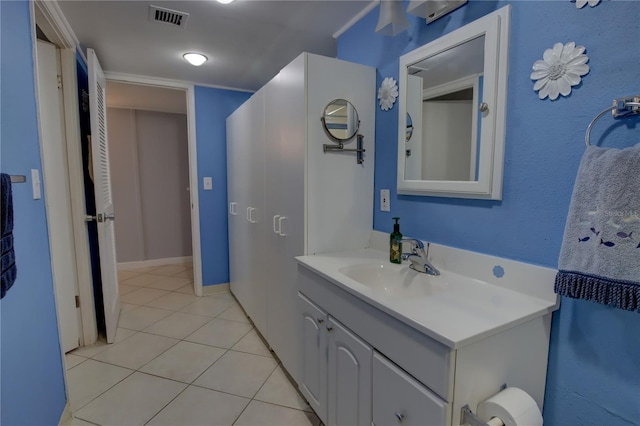 bathroom featuring vanity and tile patterned flooring