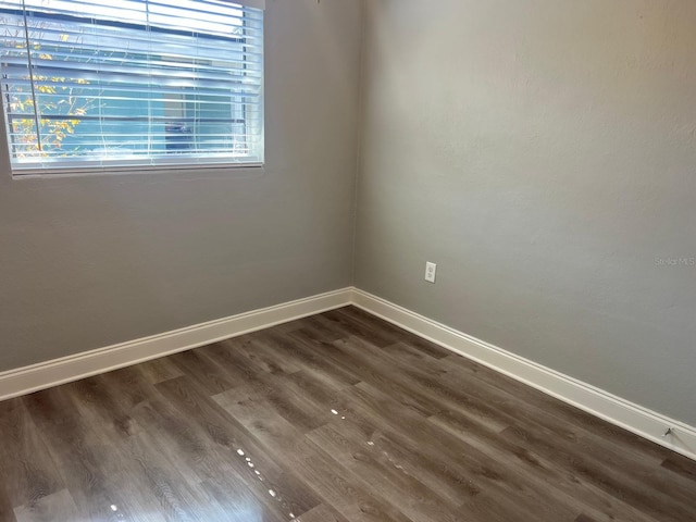 1315 Carlsbad Pl, Orlando, FL 32808 - unfurnished room featuring dark wood-type flooring