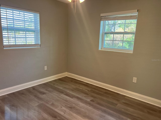 1315 Carlsbad Pl, Orlando, FL 32808 - spare room with dark hardwood / wood-style floors