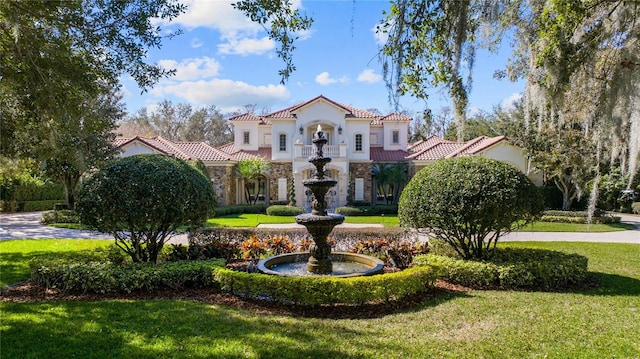 view of property's community with a yard