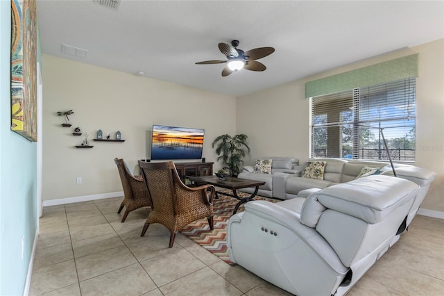1494 Moon Valley Dr, Davenport, FL 33896 - living area featuring ceiling fan and light tile patterned floors