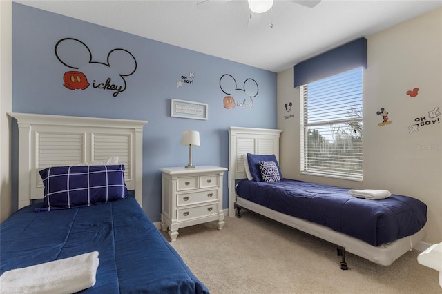 1494 Moon Valley Dr, Davenport, FL 33896 - bedroom featuring carpet floors and a ceiling fan