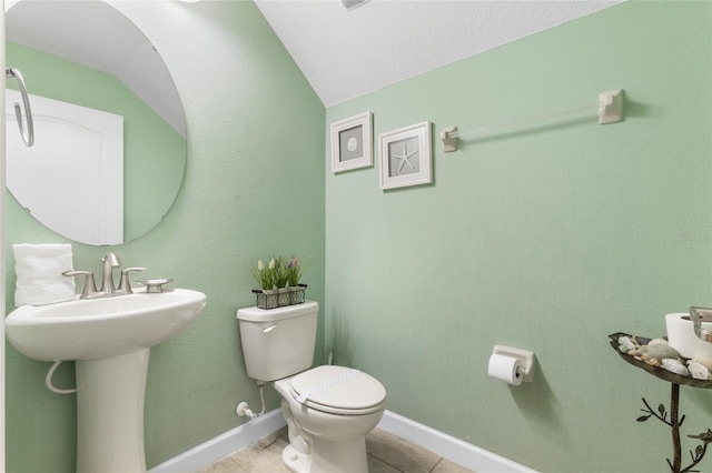 1494 Moon Valley Dr, Davenport, FL 33896 - bathroom with tile patterned floors and vaulted ceiling