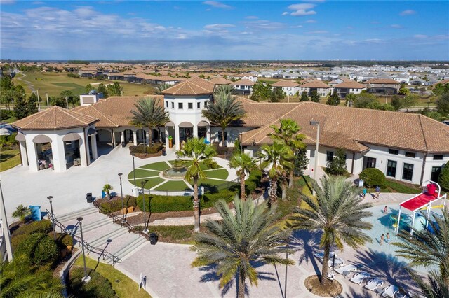 1494 Moon Valley Dr, Davenport, FL 33896 - aerial perspective of suburban area