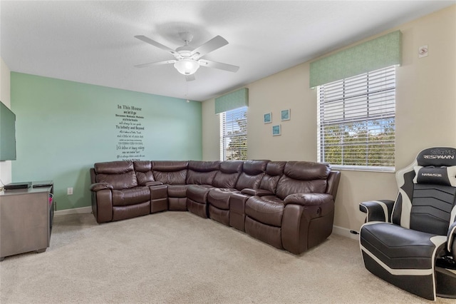 1494 Moon Valley Dr, Davenport, FL 33896 - carpeted living room featuring ceiling fan and baseboards