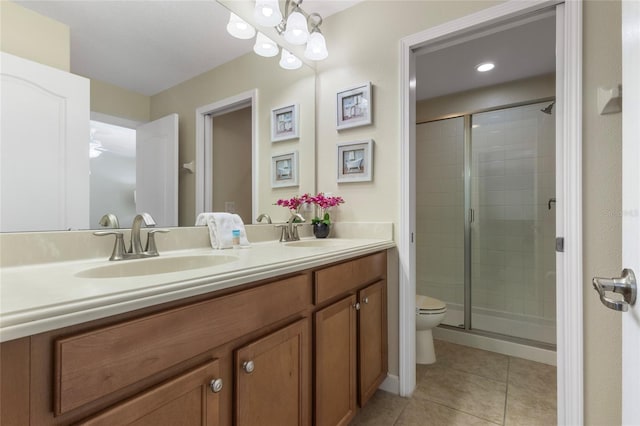 1494 Moon Valley Dr, Davenport, FL 33896 - bathroom featuring double vanity, a stall shower, tile patterned floors, and a chandelier