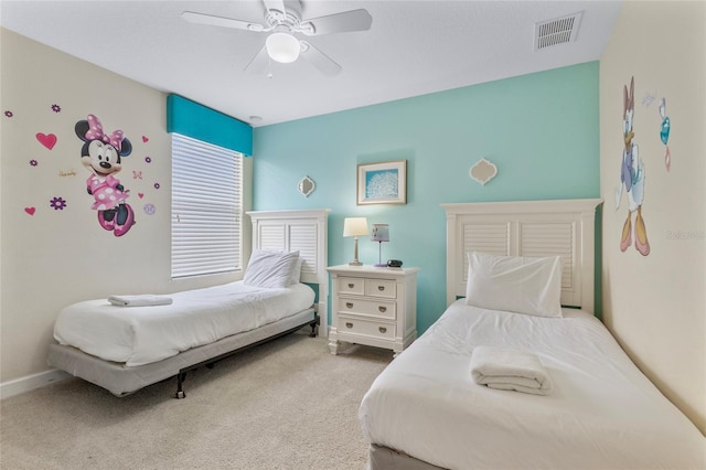 1494 Moon Valley Dr, Davenport, FL 33896 - carpeted bedroom with a ceiling fan and baseboards