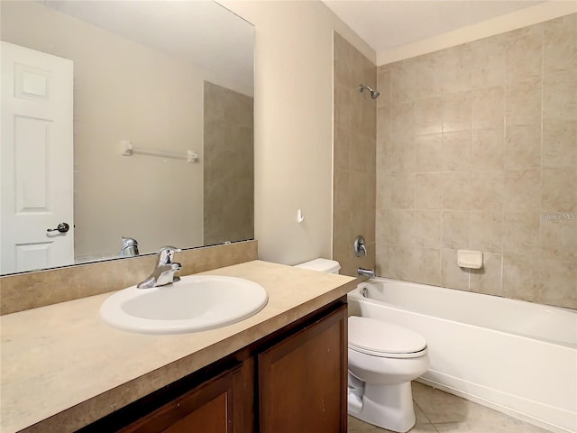 1515 Angler Ave, Kissimmee, FL 34746 - full bathroom with tile patterned flooring, tiled shower / bath, vanity, and toilet