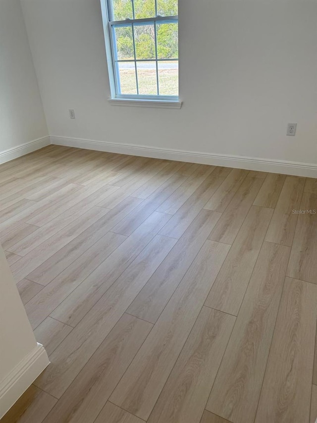 empty room featuring light wood-type flooring