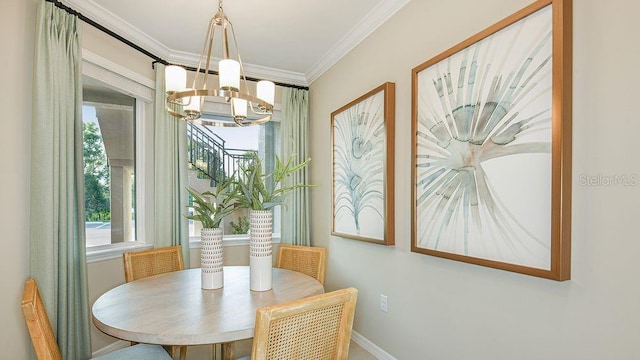 dining room featuring an inviting chandelier and ornamental molding